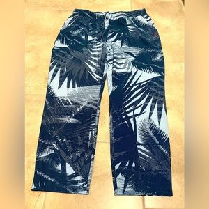 Sporty wide leg pants in tropical print, cooling airy synthetic material